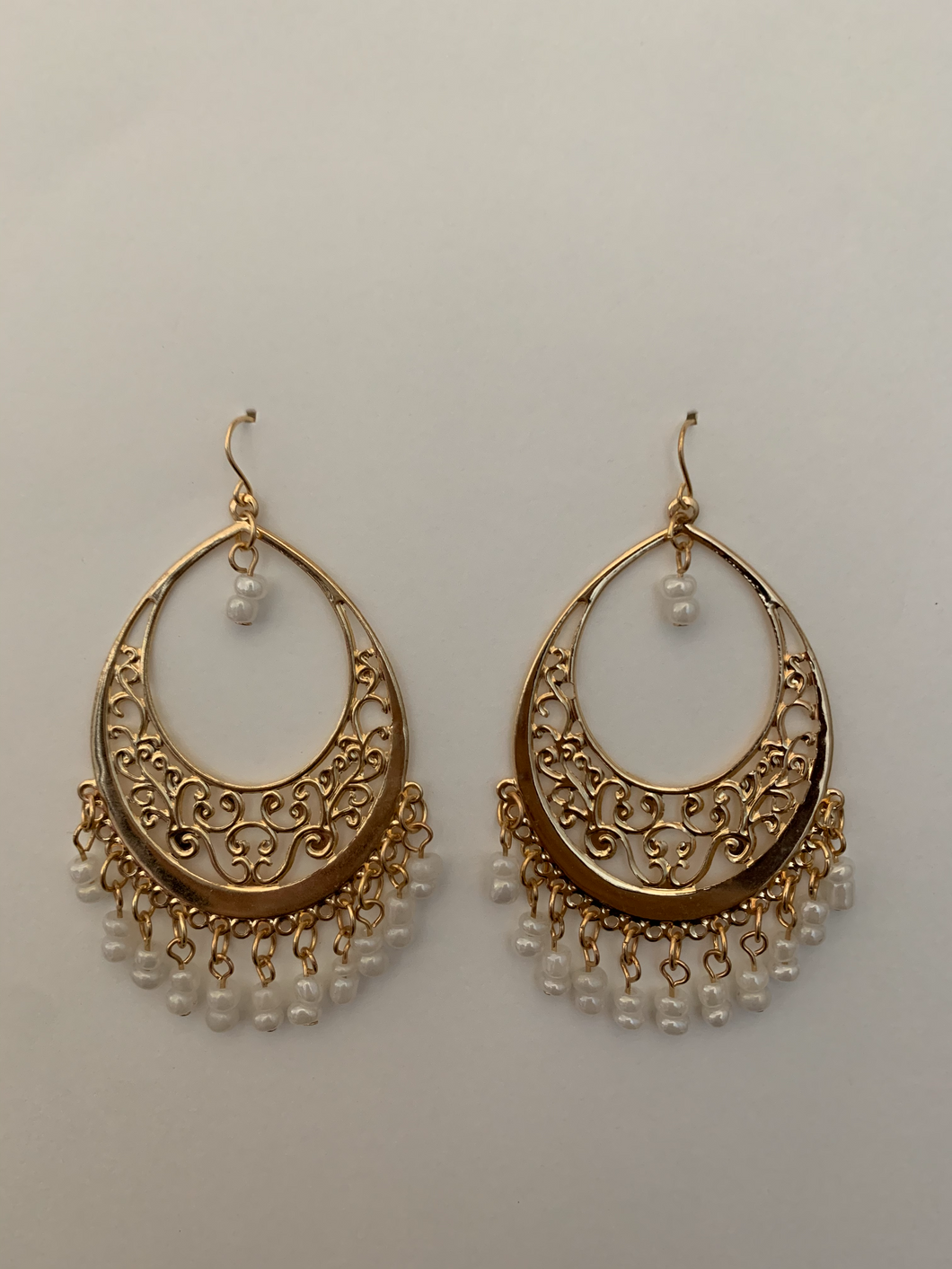 Oval Shaped Gold Hanging Earrings